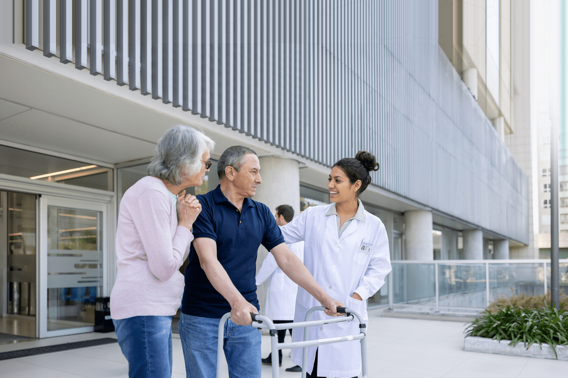 Husband and wife leave hospital with doctor