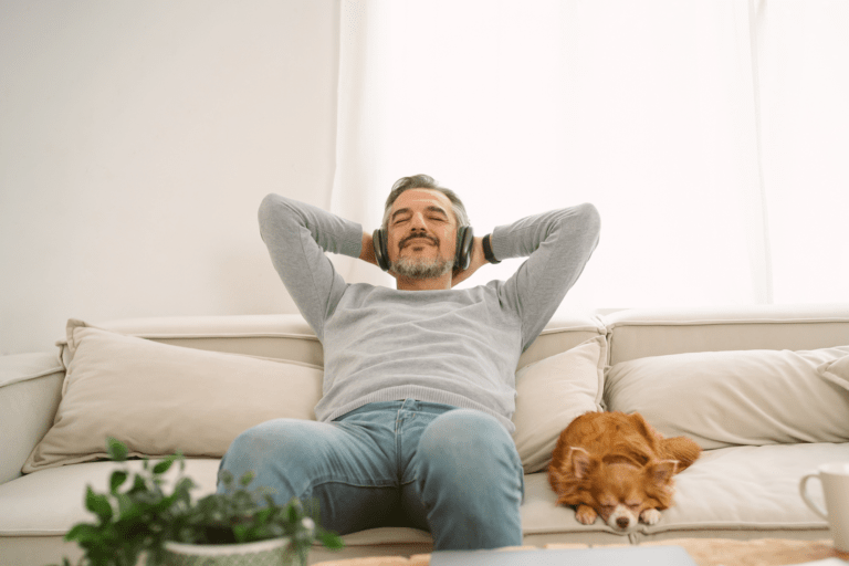 Respite care allows woman to relax on the couch with her eyes closed