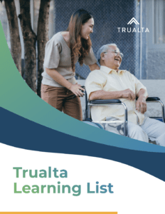 A smiling caregiver with an elderly man in a wheelchair enjoying a moment outside, representing Trualta's eLearning caregiver training services.