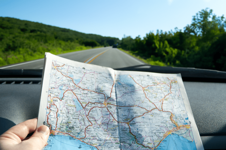 Road map in a car while driving on a country road